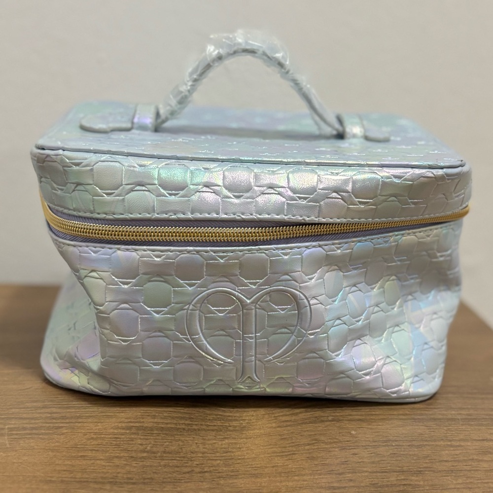 Cle de Peau iridescent silver makeup bag brand new